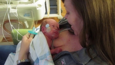 Mom Holding Baby for the First Time (32 Week Preemie)