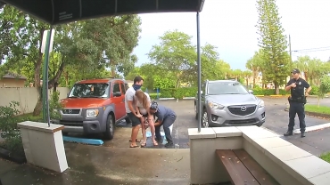 Midwife Aids Baby Delivery in Parking Lot