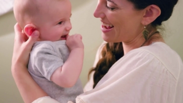 How to Put a Onesie on a Baby?