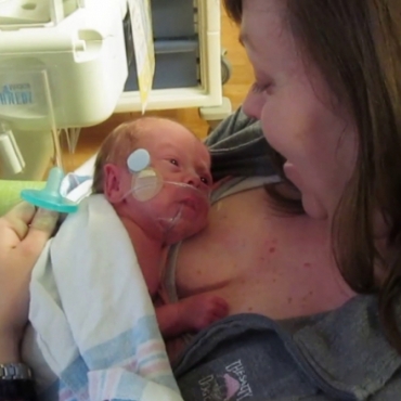 Mom Holding Baby for the First Time (32 Week Preemie)